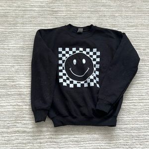 Black sweatshirt with smiley face